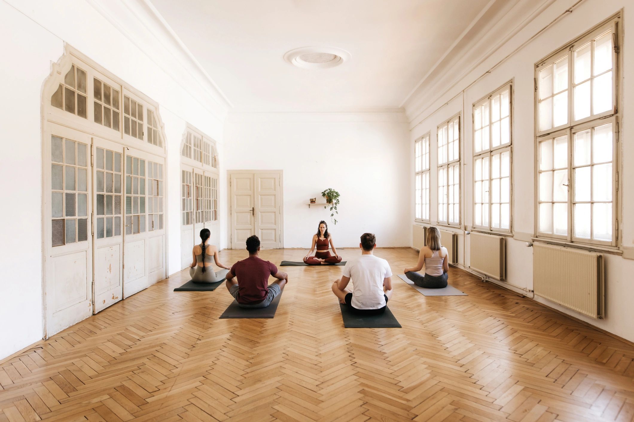 Group gathering for a guided meditation session