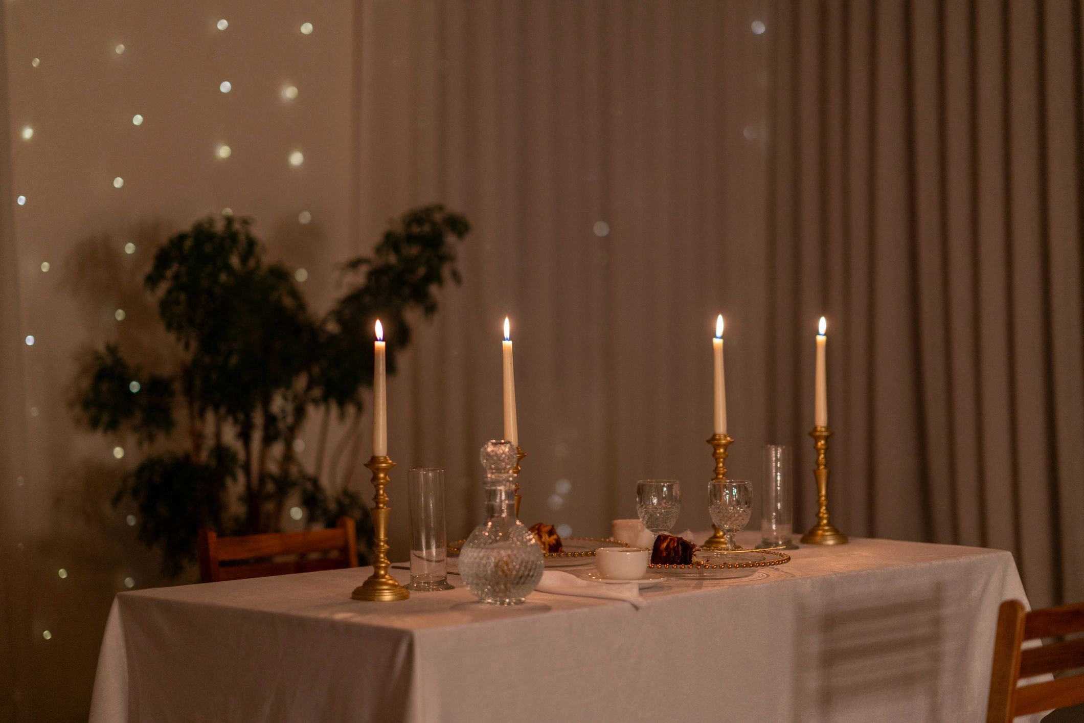 Warm candlelit table setting for an intimate event
