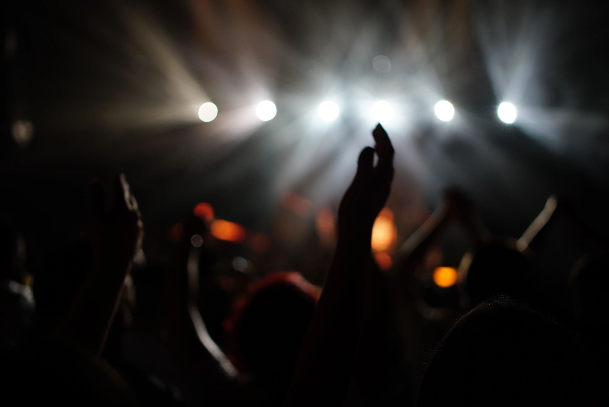 Audience gathered together at a live evening event
